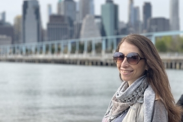 Marina Sorochinski, Ph.D. by the NYC skyline