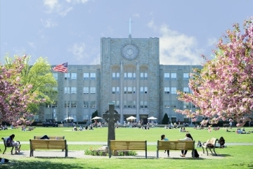 Students in front of St. Augustine Hall St. John’s University’s Queens Campus