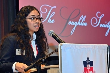 Natalia Acevedo speaking at podium