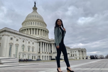 Vanessa Diaz in front of capital building