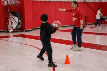 St. John’s Athletes Host Special-Needs Students from NYC