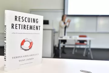 Close up of book titled Rescuing Retirement
