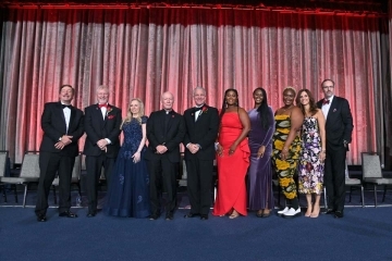 A group of people dressed up at St. John's President's Dinner