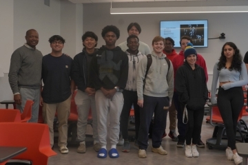 CCPS students and Dr. Amos pose for a group photo