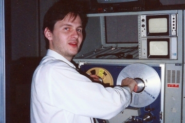 Michael Sheehan ’87SVC working tape machine from the 80s