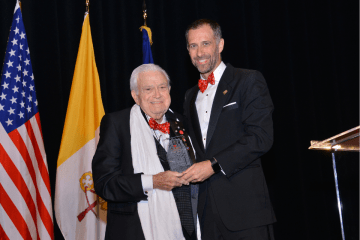 St. John's Law alumnus Joseph M. Mattone, Sr. and Dean Michael A. Simons.