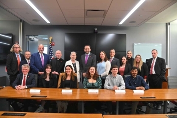 Senator Gillibrand with St. John's and CCPS employees in Sanford Lab