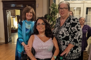 STEPHANIE DEBES’17CCPS, St. John's Alumna, with two females