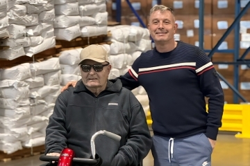 Frank Collette ’86CBA and his father at Glendale Warehouse and Distribution Corporation warehouse