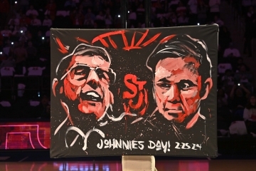 Coach Lou Carnesecca and Coach Rick Pitino Painting at MSG center court