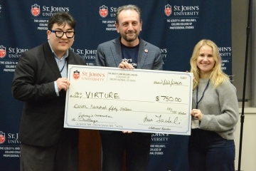 2025 Johnny's Innovation Challenge winners holding up check with Dean Iandoli