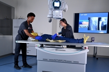Two students working in the St. John's Radiologic lab