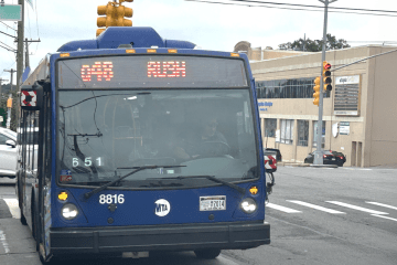 Q46 Bus Rush driving west