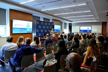 Wide-angle view of Justice Initiative Center panel discussion