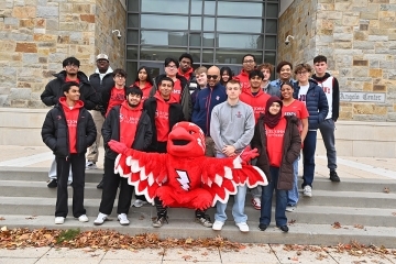High school students standing on steps of DAC
