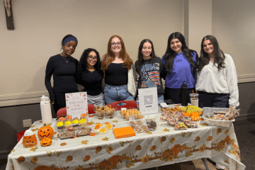 Isabella Marino, Sydney Dufour, and their team at their fundraising bake sale in Marillac.
