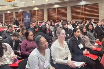 St. John's Law students sit in the audience at the inaugural Public Interest Intensive.