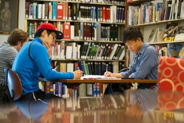 Students studying in the library.