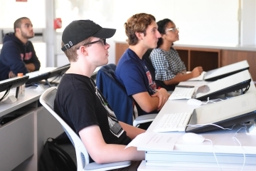 Students sitting at desk in class