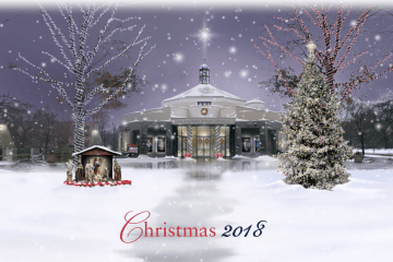 St Thomas More Church decorated for Christmas with snow falling