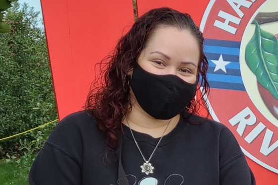 Jeanette Lazo wearing a mask and posing for a photo