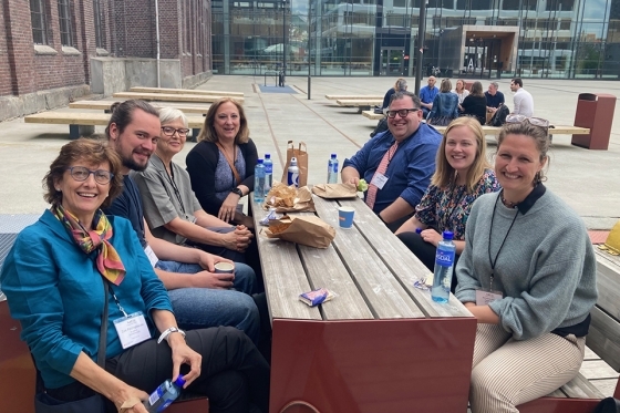 GOLE and VID Partners sitting at a table