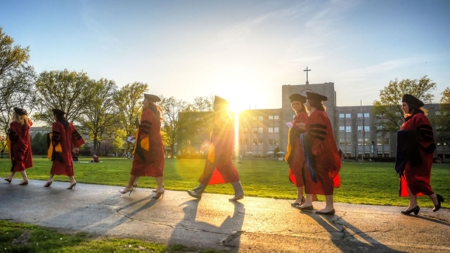 Students walking at graduation 
