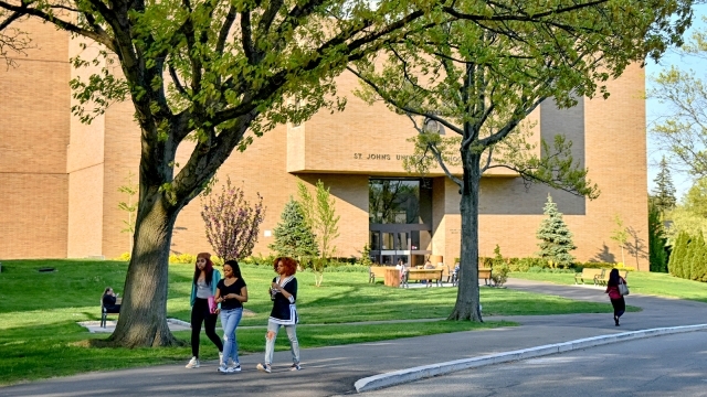 Students Walking Infront of Law School Building