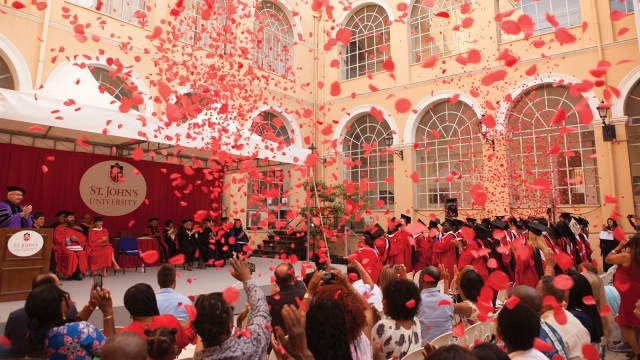 Confetti flying over the heads at Commencement ceremony