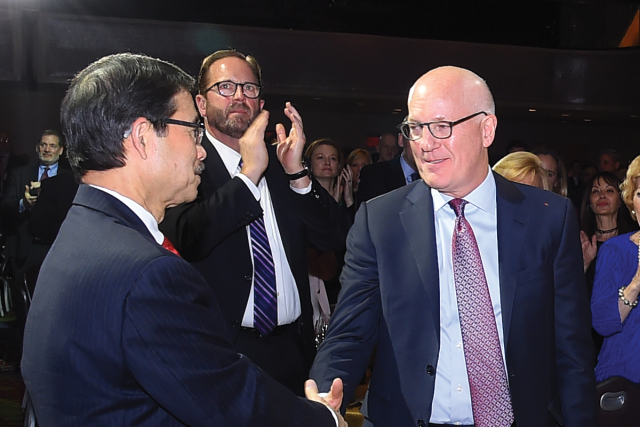 Conrado “Bobby” Gempesaw, Ph.D., President, and Daniel S. Glaser 