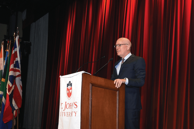 Daniel S. Glaser standing at the podium