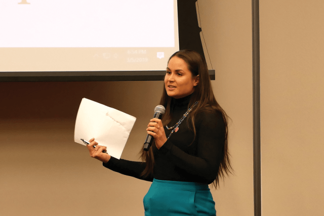 Female woman speaking with microphone