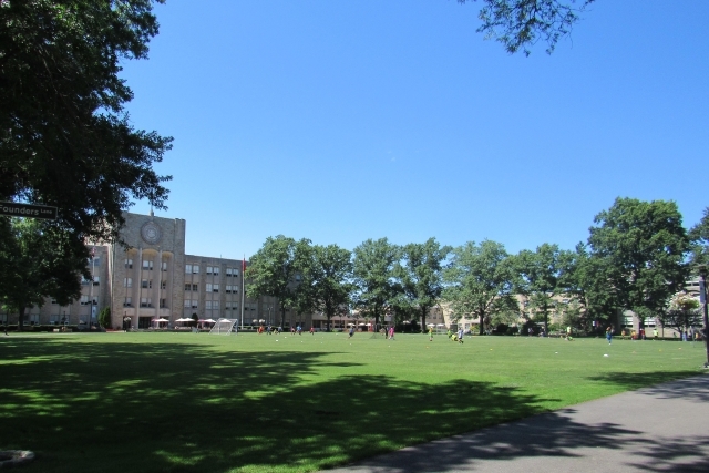 Wide shot of St. John's University Great Lawn
