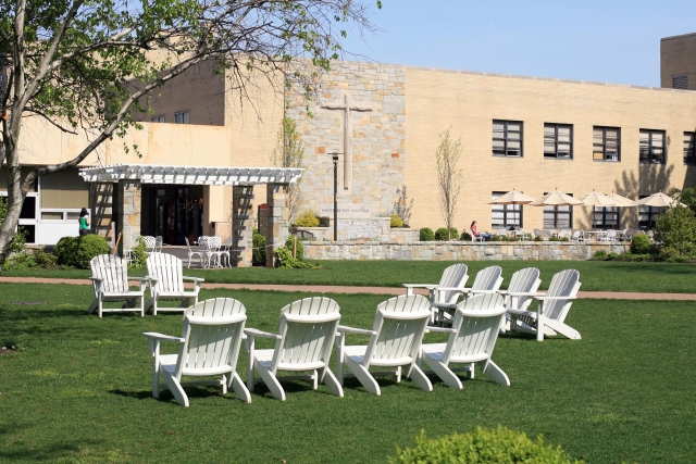 White Adirondack Chairs on Great Lawn