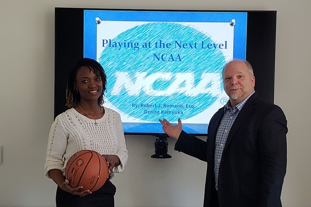 Attorney Romano and Denise Kamyuka in front of NCAA logo on screen