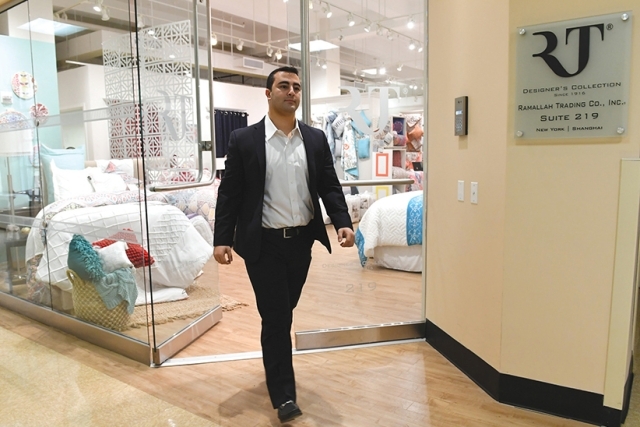 Albert Bateh walking out of store