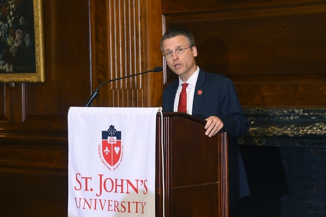 Chris Vaupel speaking at podium