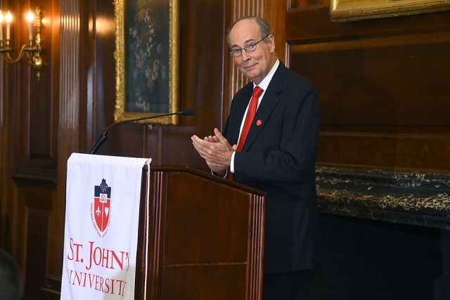 Man speaking at podium