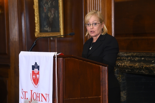 Dean Sharpe speaking at podium