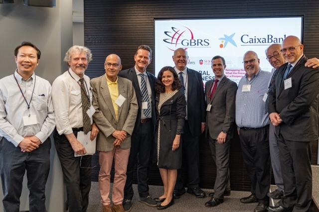 St Johns Faculty posing for photo infront of presentation screen