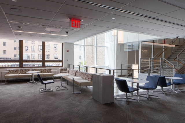 The Peter J Tobin College of Business 2nd floor lounge with seating