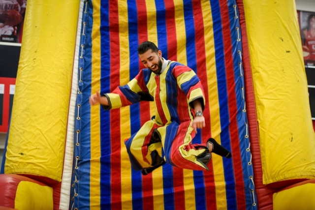 Man jumping against Velcro wall at GAHW