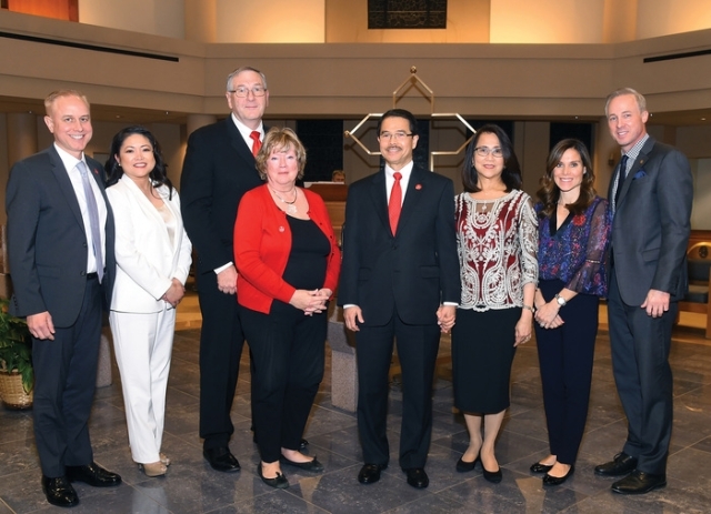 Honorees from Blessing of the couples posing for group shot inside church