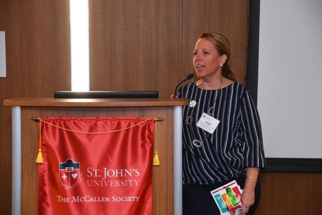 Susan Damiani at podium for 21st Annual Great Lawn Summer Concert