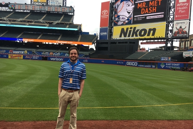 Jason Glantz standing on the baseball diamond at Citi Field