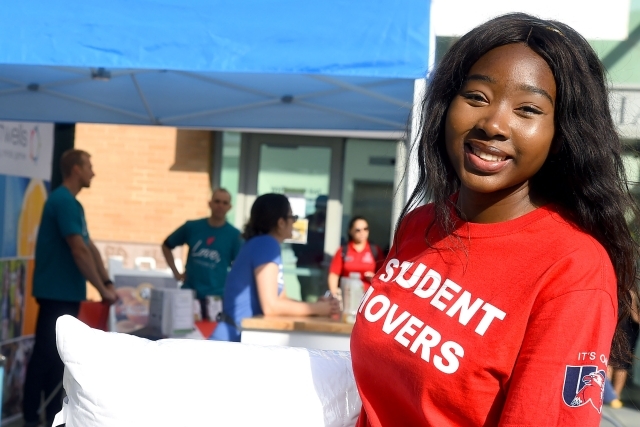 Student Mover posing for photo