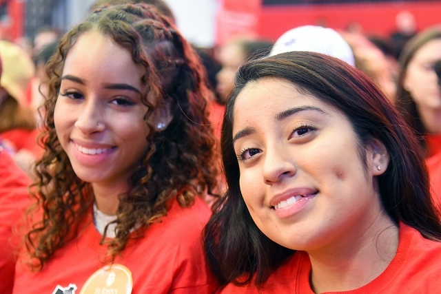 Two female students smiling at the camera