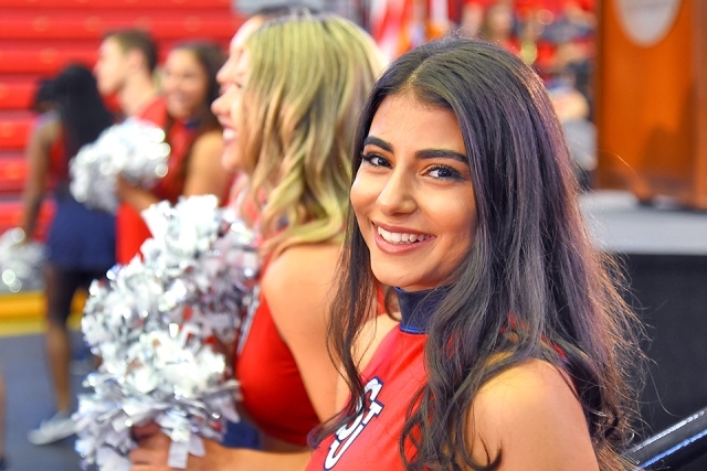 Shot of cheerleaders smiling at camera