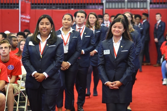 President Society Members walking into ceremony on red carpet