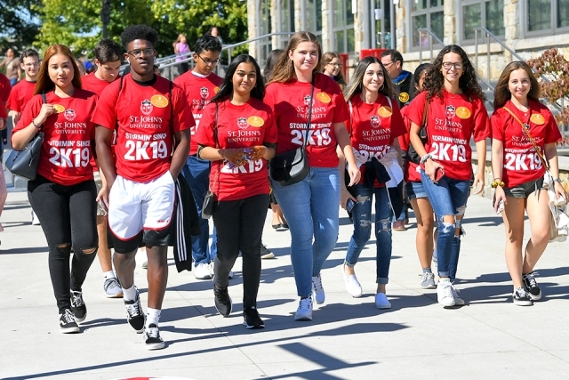 Group of students walking on campus